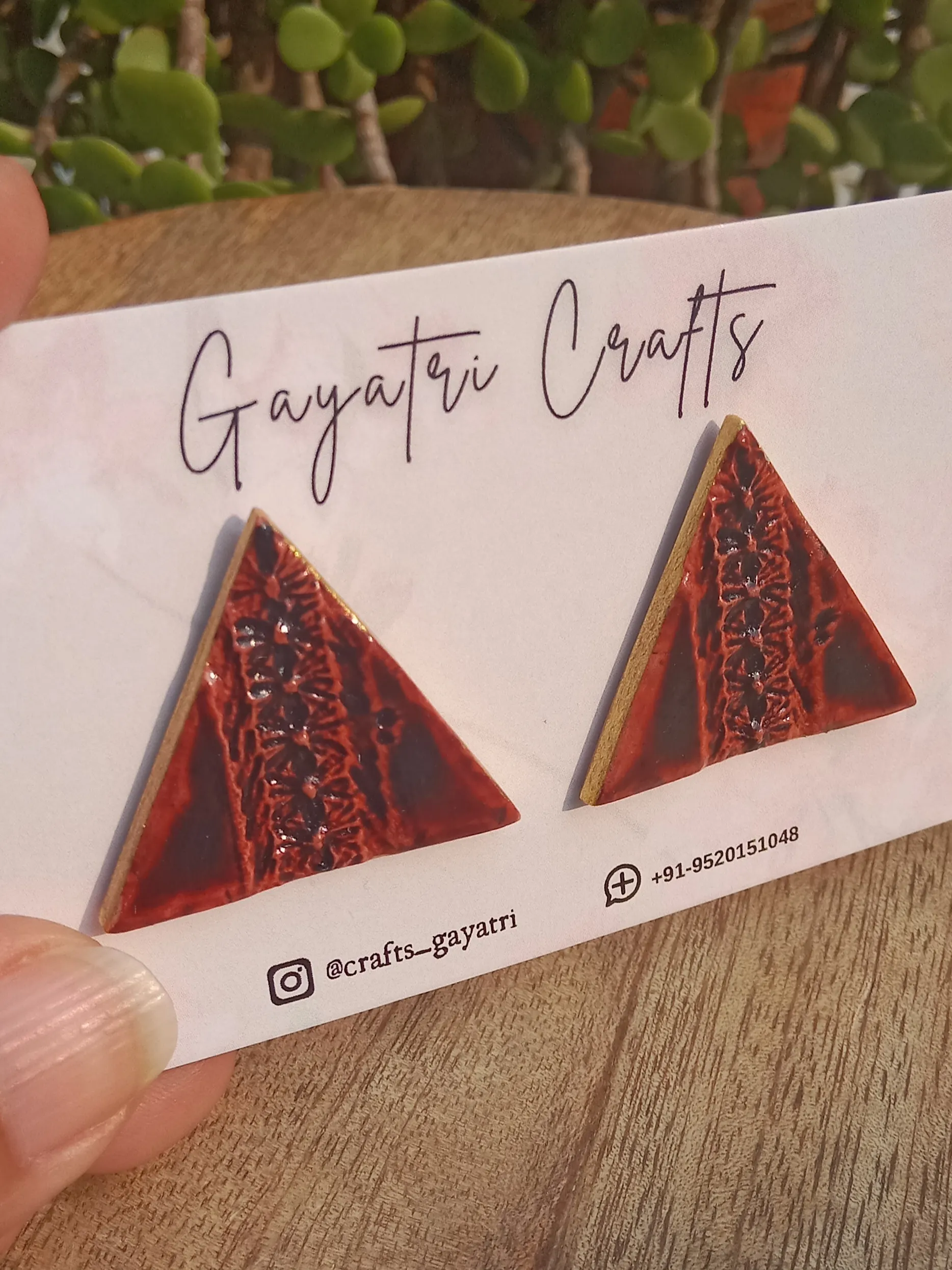 Brown Triangle Clay Studs With An Engraved Lacey Design And A Golden Border