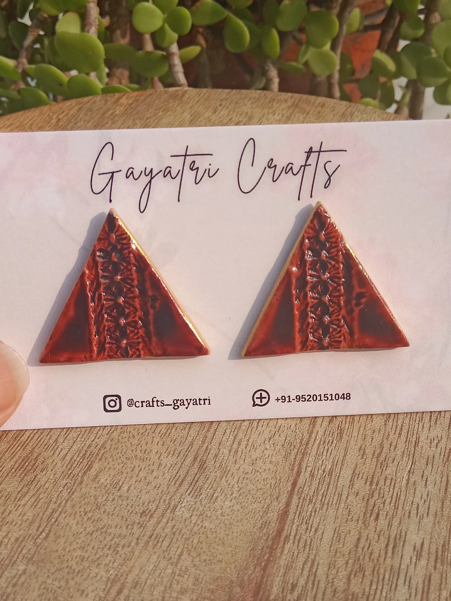 Brown Triangle Clay Studs With An Engraved Lacey Design And A Golden Border
