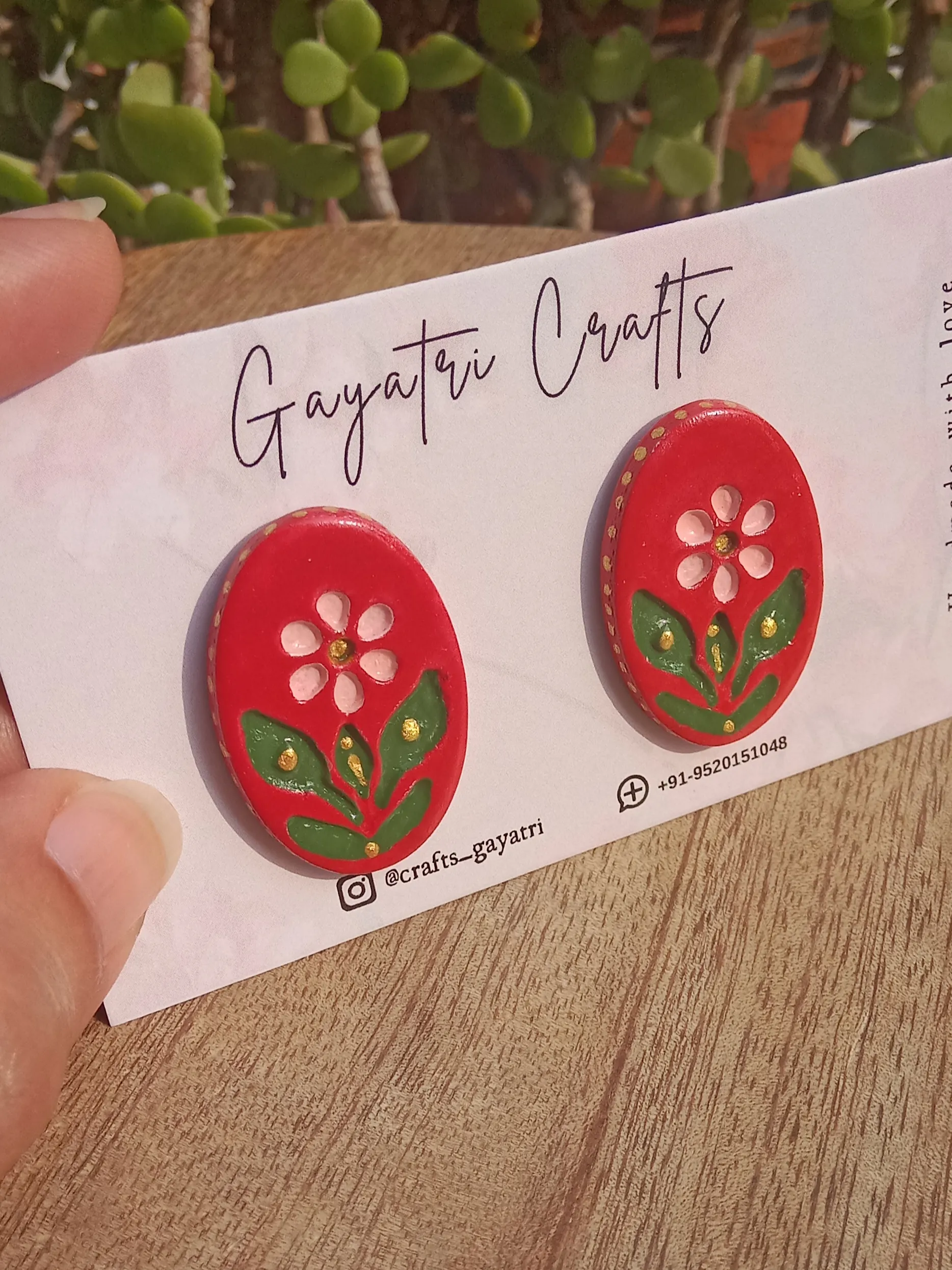 Oval Clay Studs With An Engraved Ethnic Floral Design In A Beautiful Red Colour